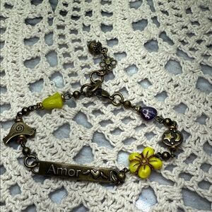 Amor Charm Bracelet with Yellow and Purple glass Accents